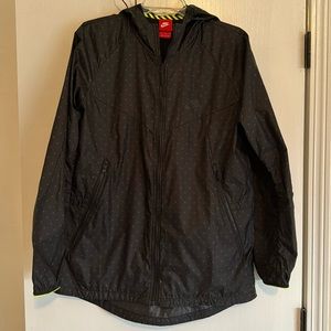 Nike lightweight coat, black polkadot size L